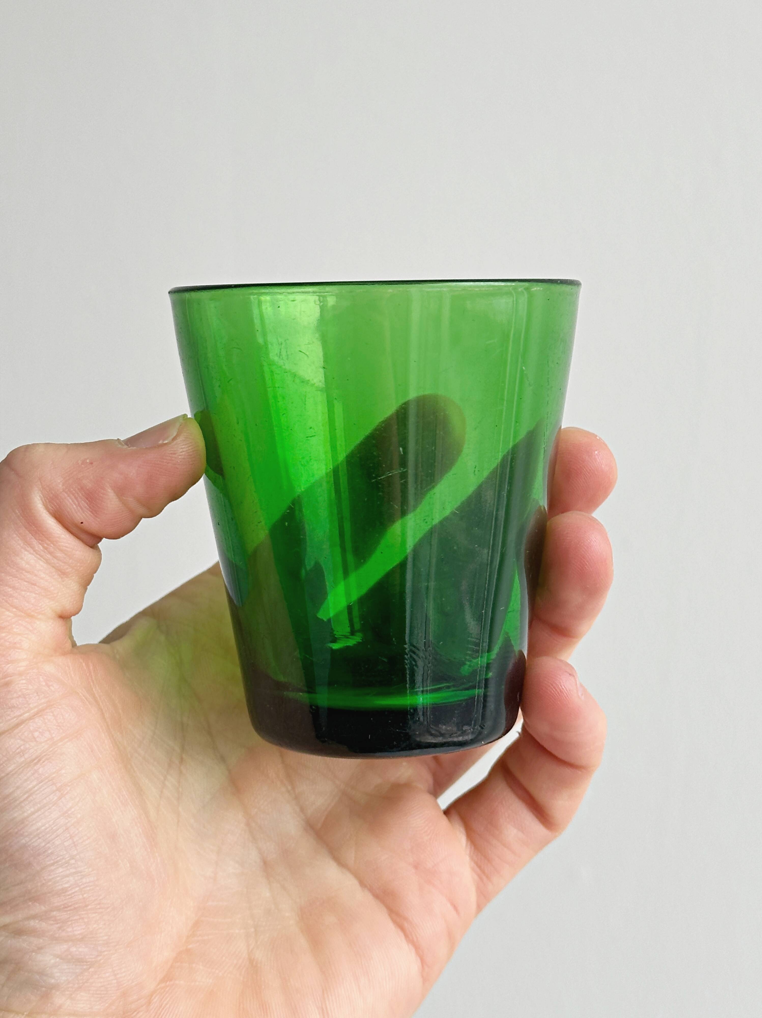 5 translucent green glasses