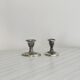 Pair of antique metal candlesticks