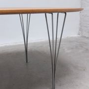 ‘Super-Elliptical’ table in oak by Piet Hein & Bruno Mathsson for Fritz Hansen, 1968