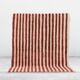 A handmade Moroccan striped terracotta rug, 150/250cm