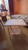 Vintage bedside table in bamboo and rattan with decorative top.