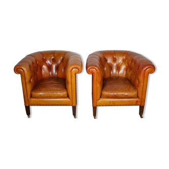 Set of 2 vintage Chesterfield club armchairs in cognac leather
