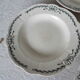 4 assiettes semi creuses terre de fer Longchamp