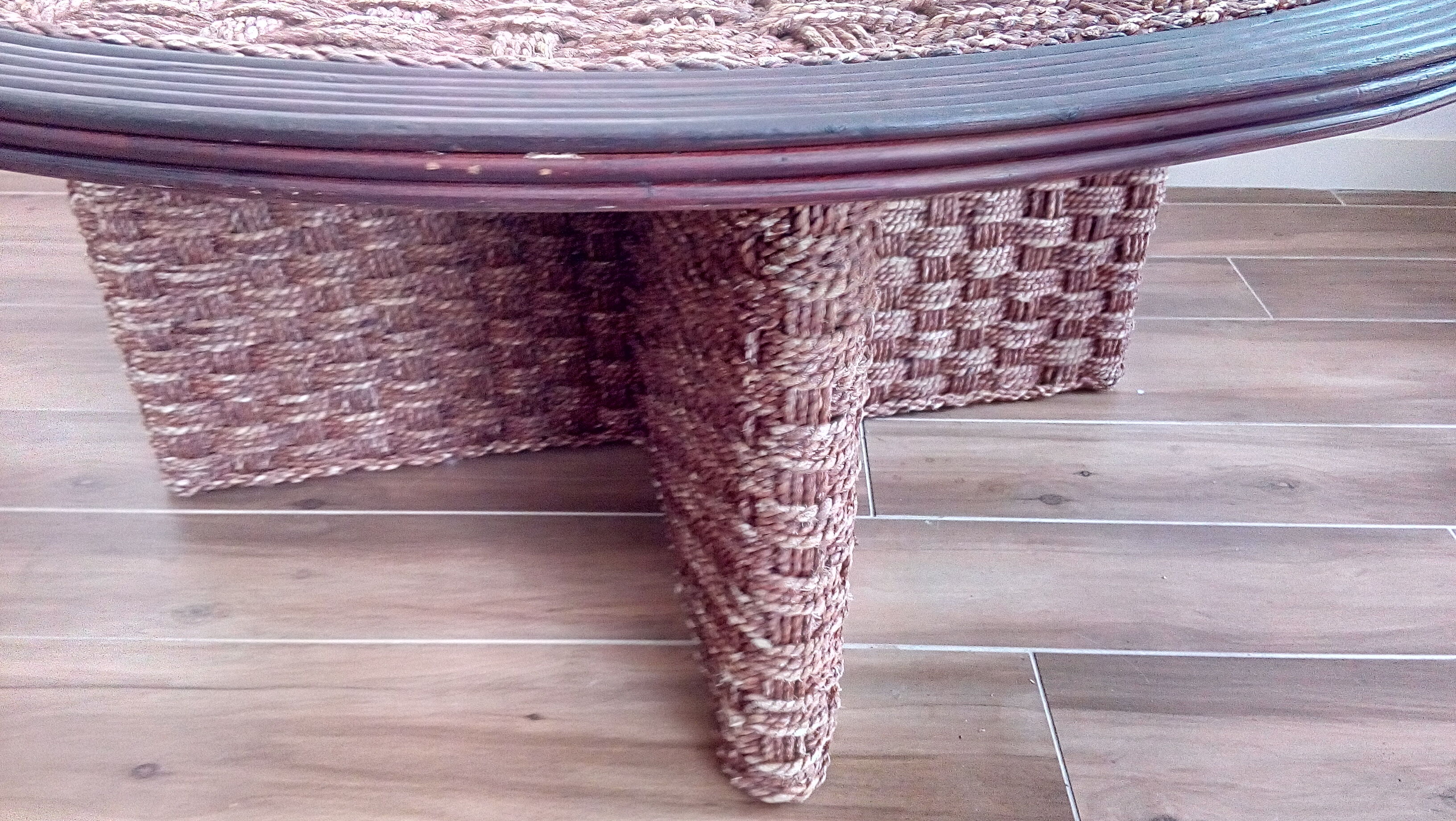 Coffee table in woven rope and rattan