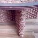 Coffee table in woven rope and rattan
