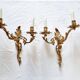 Pair of vintage French wall sconces in bronze, Louis XV Rococo style.