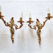 Pair of vintage French wall sconces in bronze, Louis XV Rococo style.