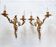Pair of vintage French wall sconces in bronze, Louis XV Rococo style.