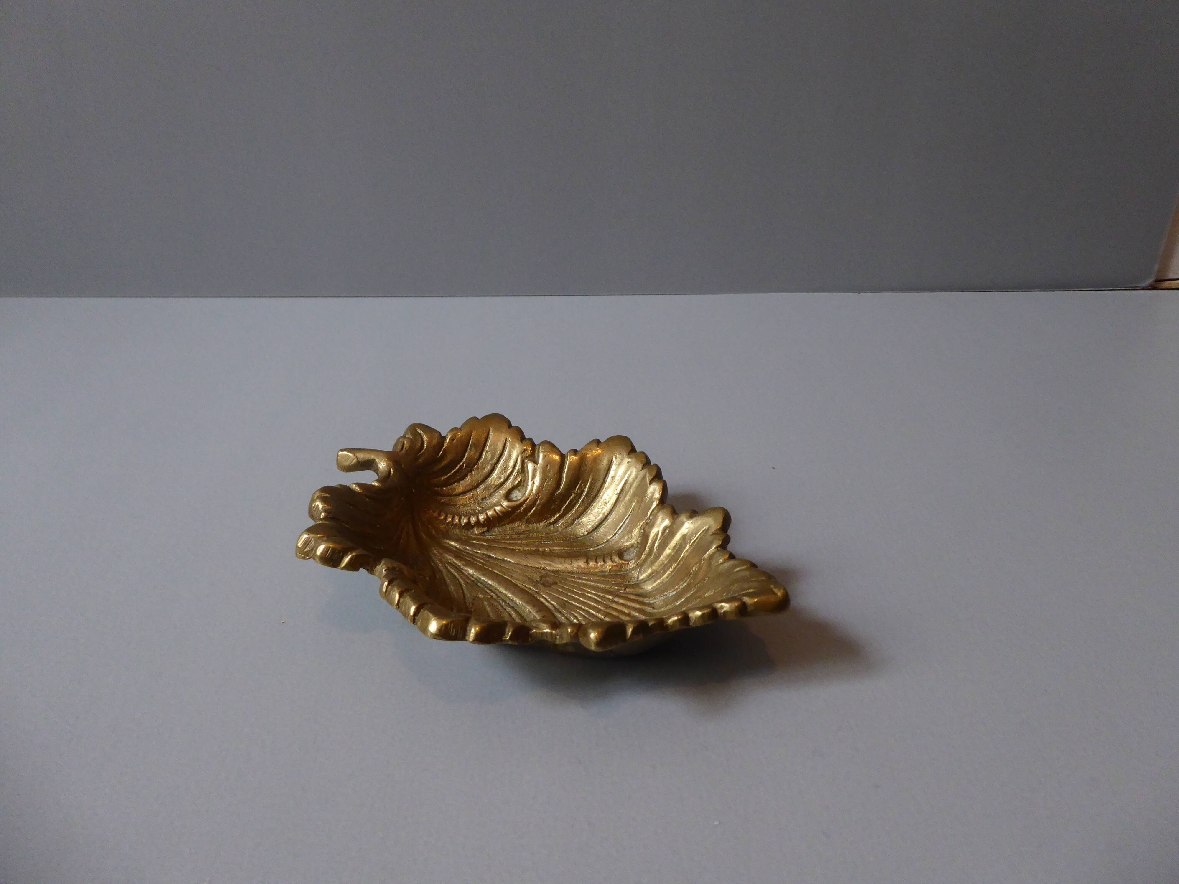 Empty gilded bronze pocket