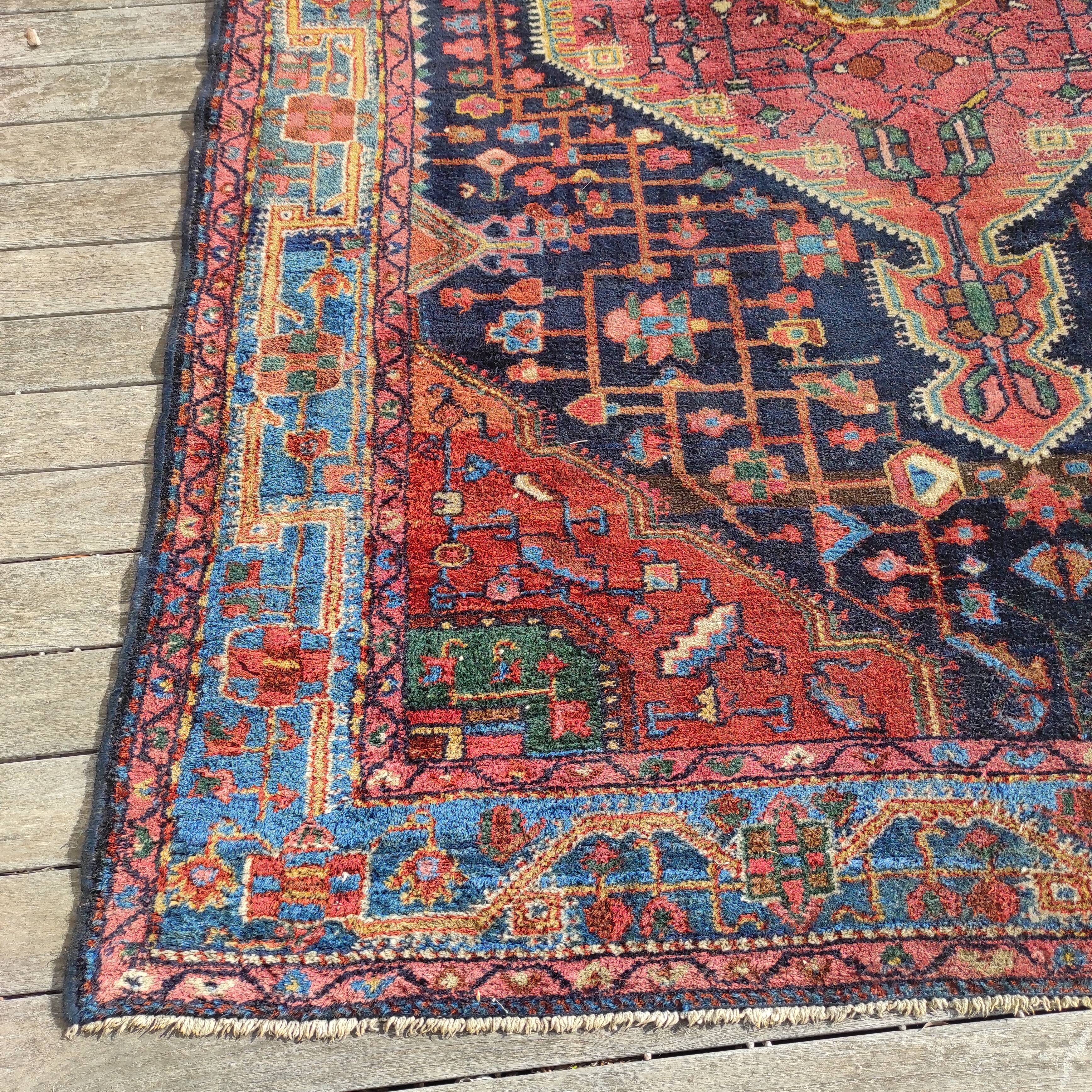 Old Persian carpet 1.62 m wide and 2.33 meters long