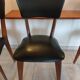 5 chairs in wood and black faux leather, Scandinavian style
