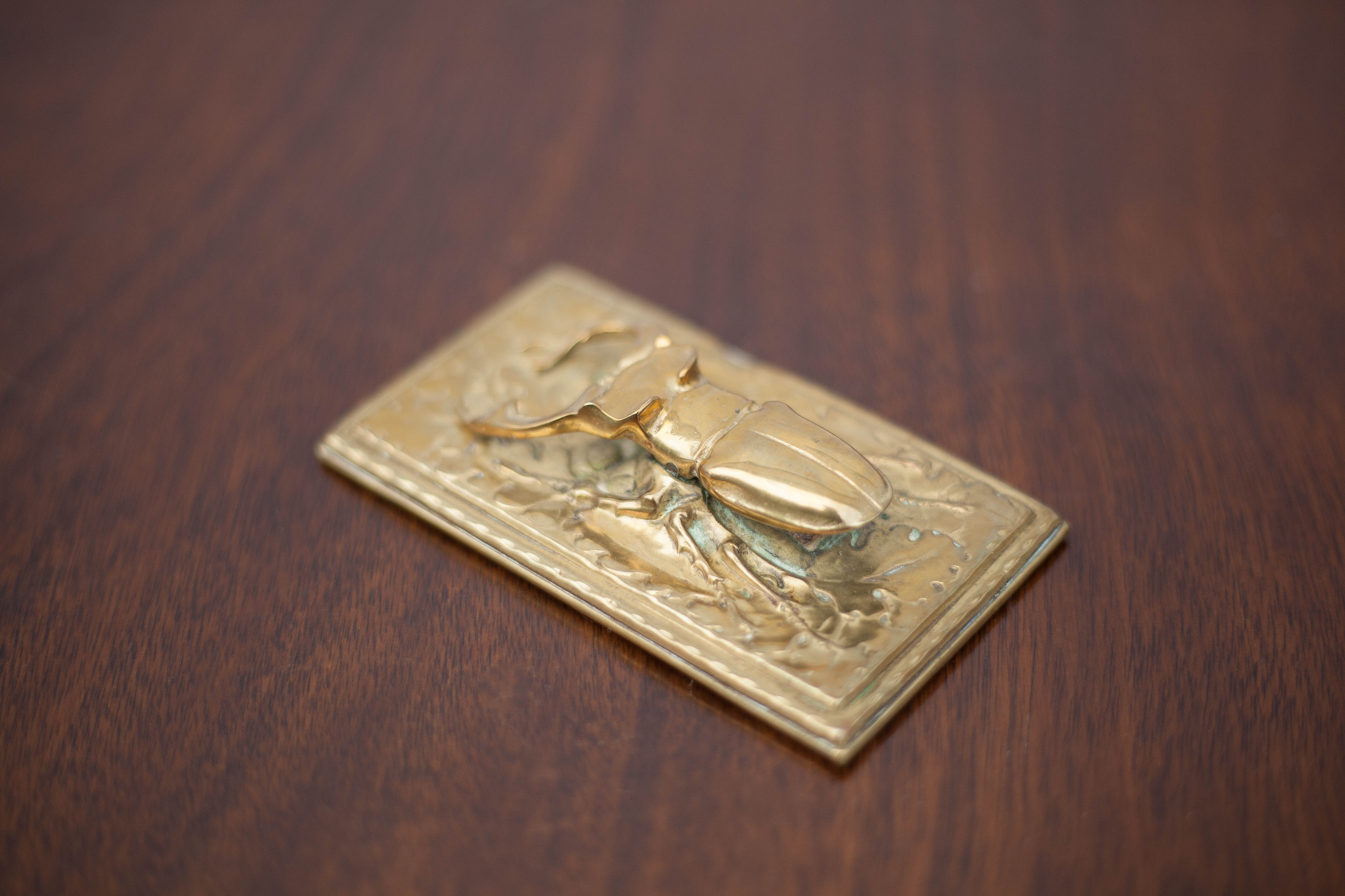 Scarab brass mail clip