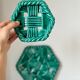 Trio of barbotine art deco coasters and bottle coasters
