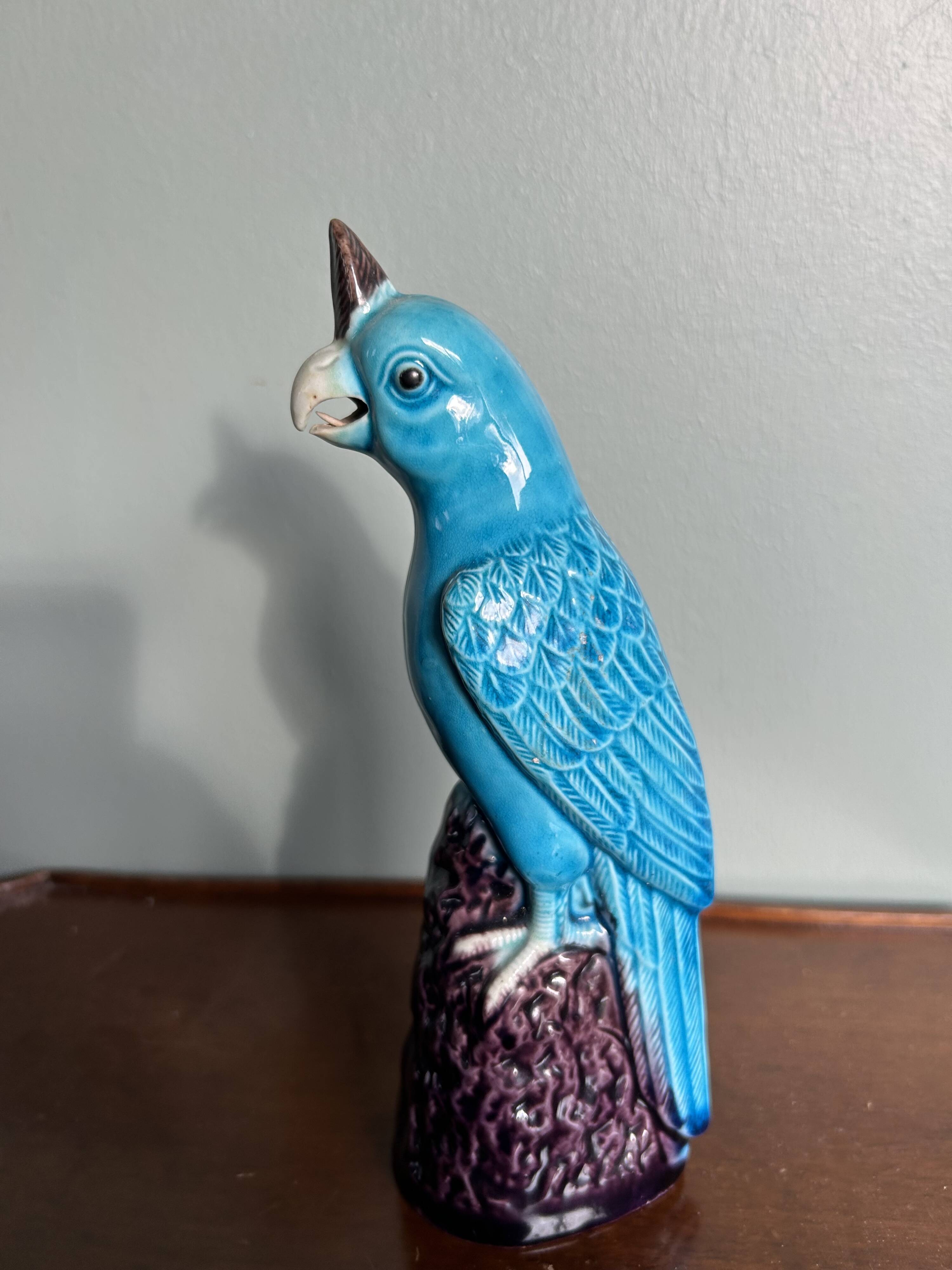 Porcelain parrot statuette