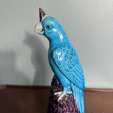 Porcelain parrot statuette