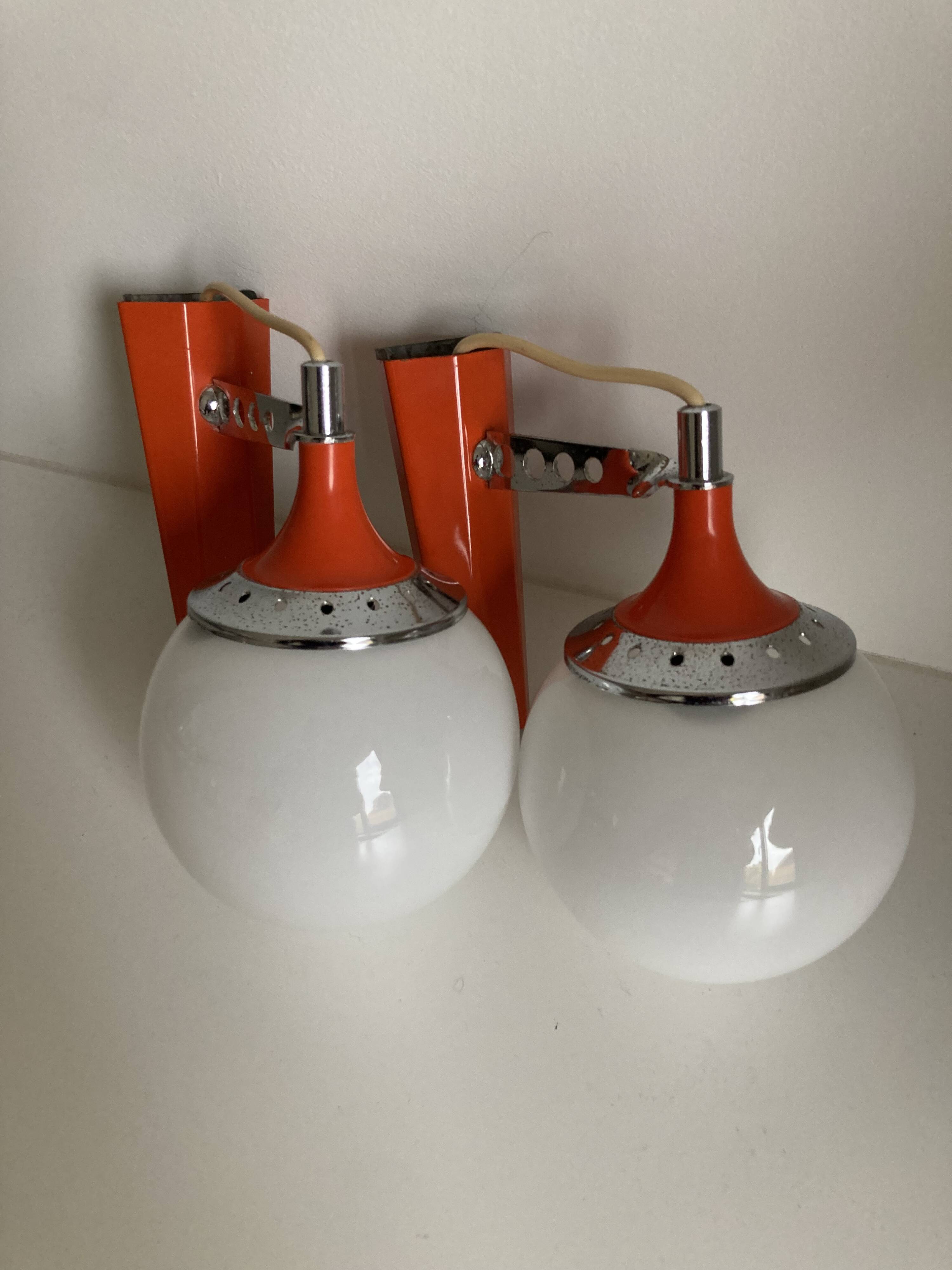 Set of two vintage orange wall lights from the 70s
