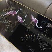 Vintage coffee table with tapered legs.