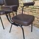 Brown faux leather armchairs