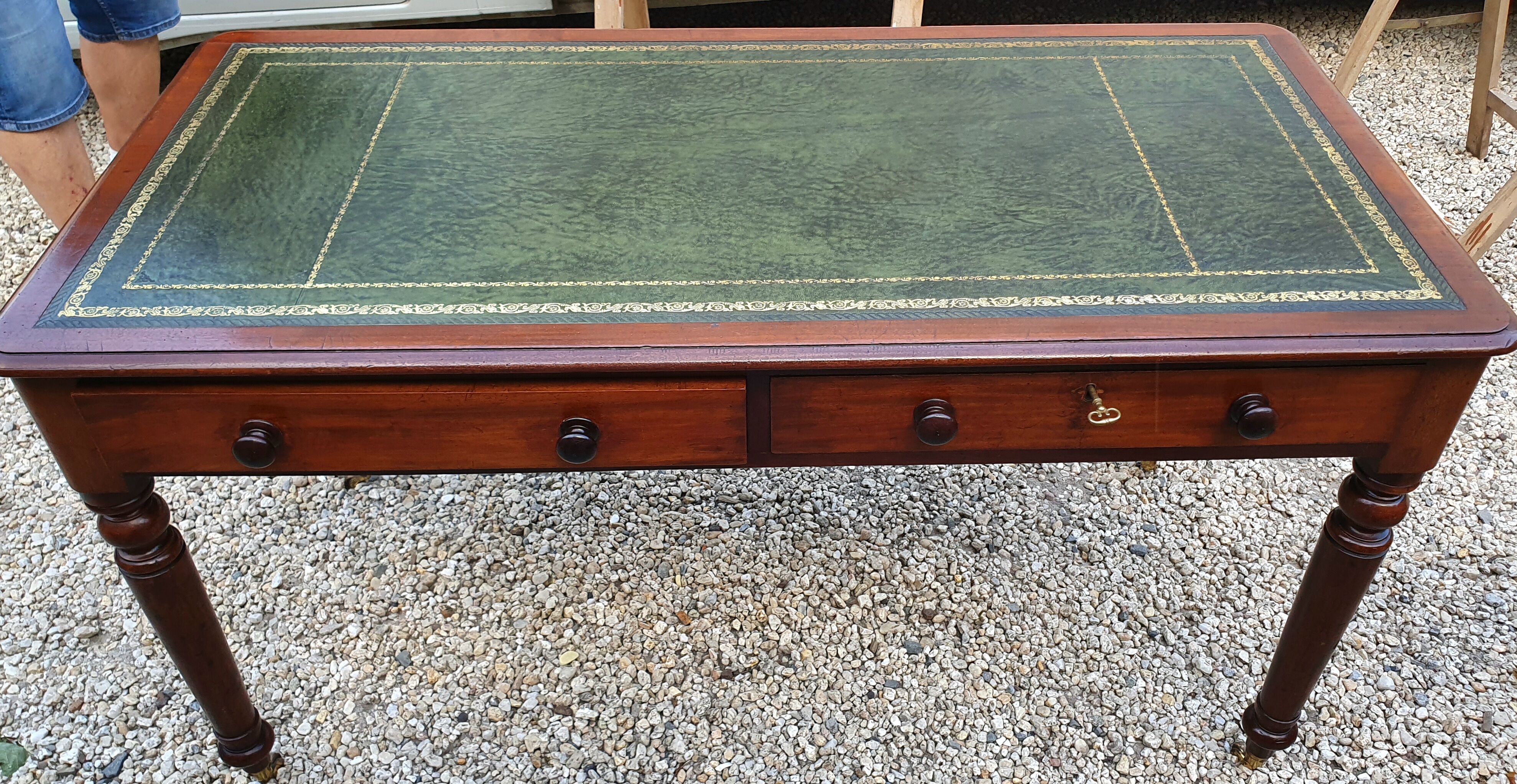 English desk with 2 drawers on green leather