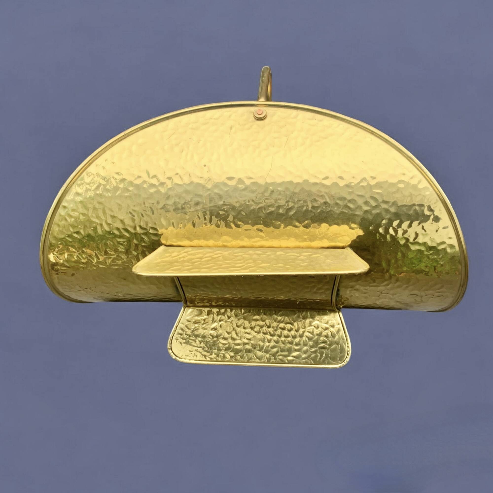 Vintage hammered brass log holder