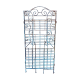 Wrought iron shelf on worked feet