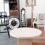 Round coffee table in travertine