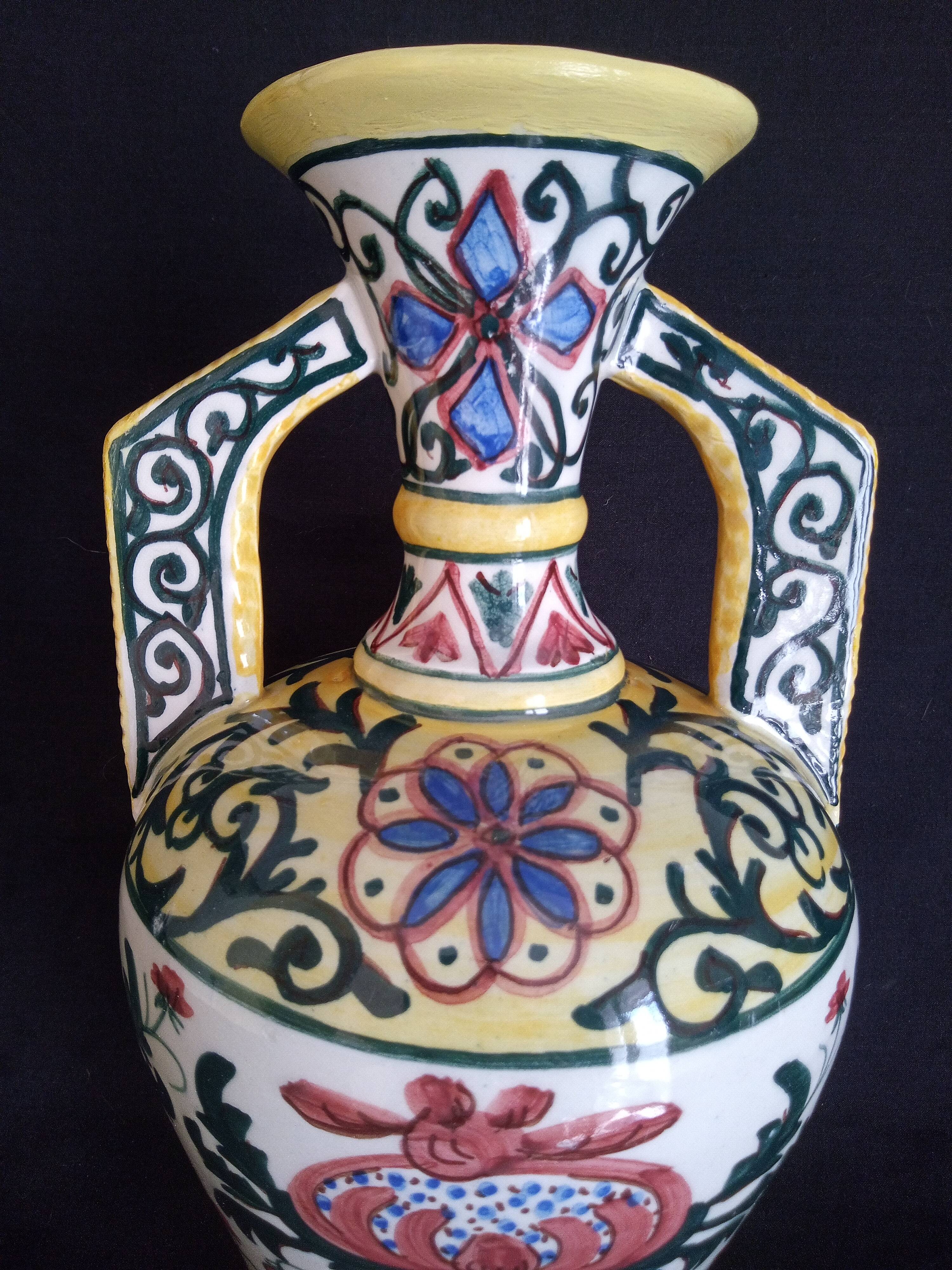 Art Deco ceramic vase with brightly colored abstract patterns