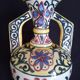 Art Deco ceramic vase with brightly colored abstract patterns