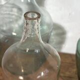 Antique colored demijohns (c.1920). Set of 3 pieces