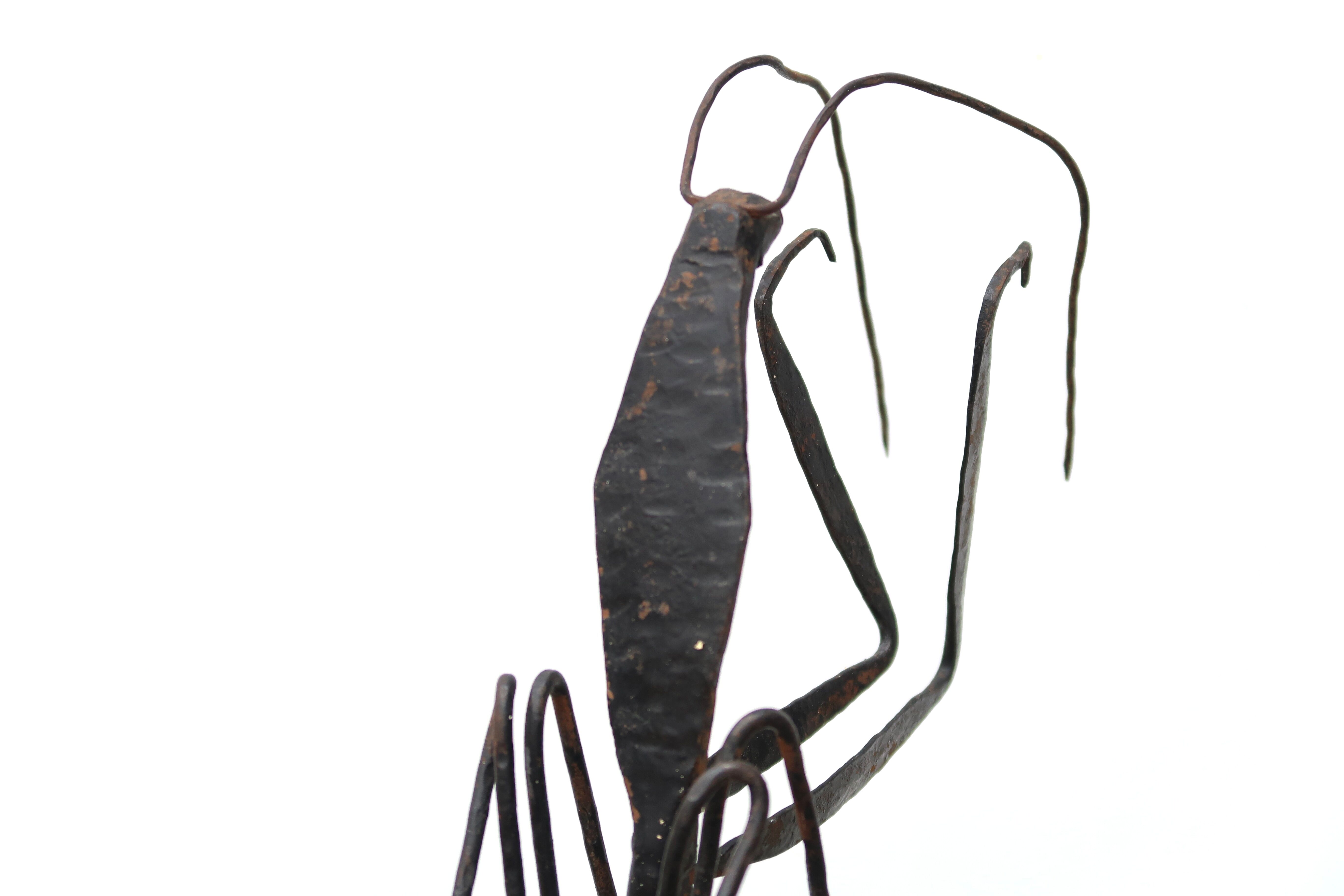 Sculpture of a religious mantis in wrought iron, 50s