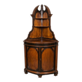 Meuble d'angle lombard en bois ébanisé fin XIXe siècle
