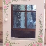 White mirrored toilet cabinet with floral pattern