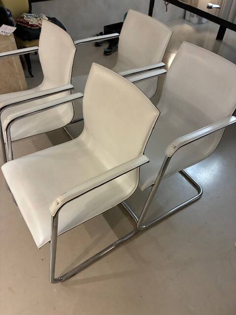 1 lot of 4 white leather office chairs