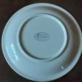 Quadrifoglio dish. Italian. Fruit and flower decoration. Shimmering colors.