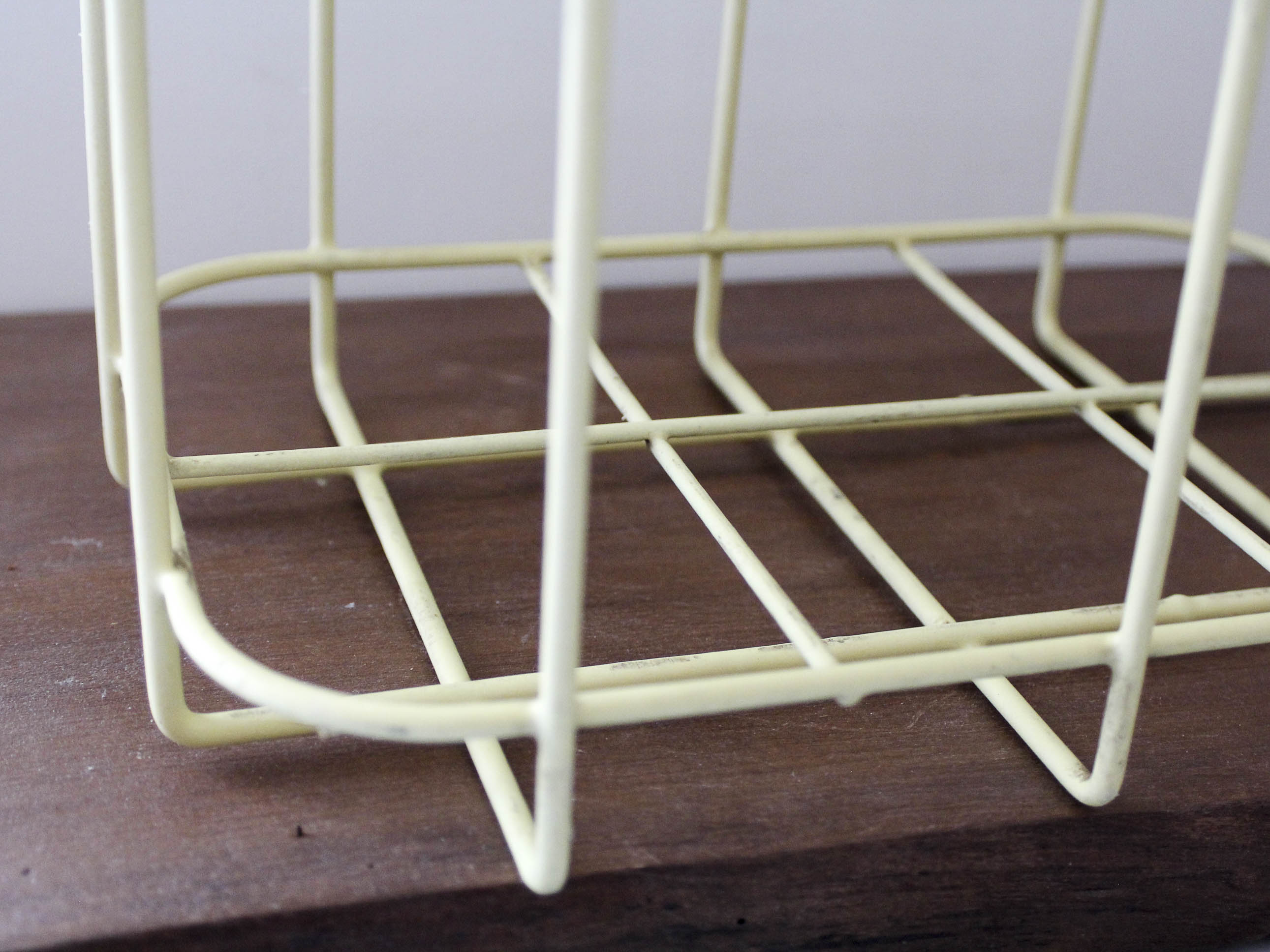 Yellow metal bottle holder