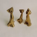 Trio of cats in gilded brass
