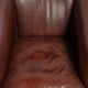 Set of 2 sheepskin club armchairs in a dark cognac colour