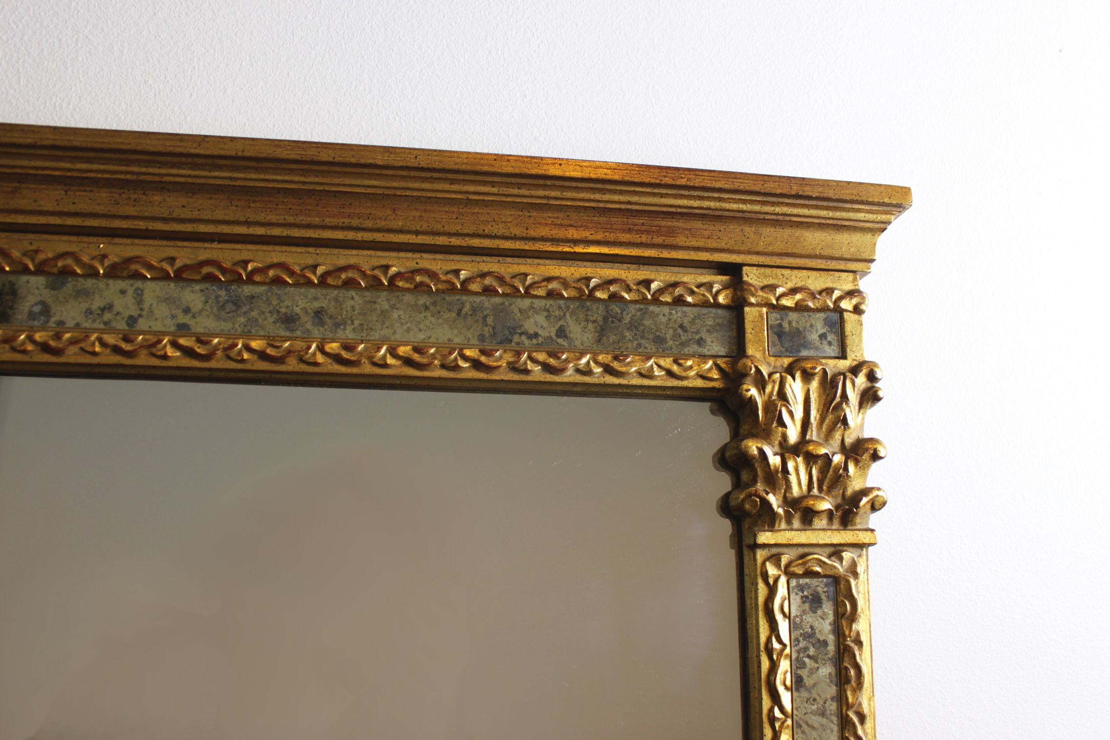 Mirror with parecloses, Regency style.