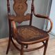 Curved wooden armchair Kohn