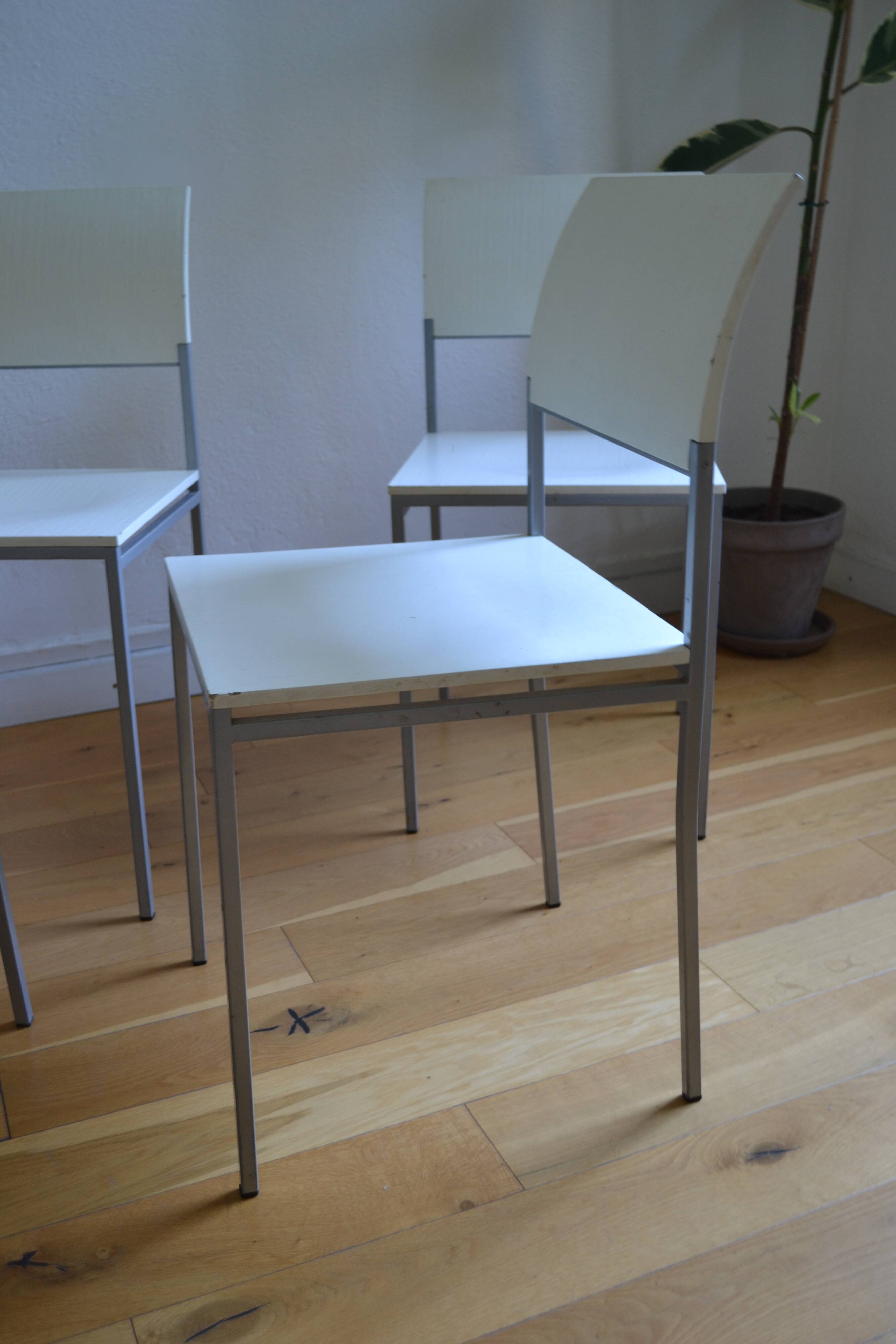 Set of 4 vintage metal and wood chairs from the 1990s.