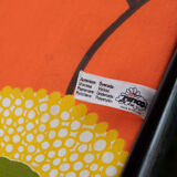 Vintage camp bed with orange flowers