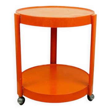 Orange circular plastic cart in Italian Space Age style.