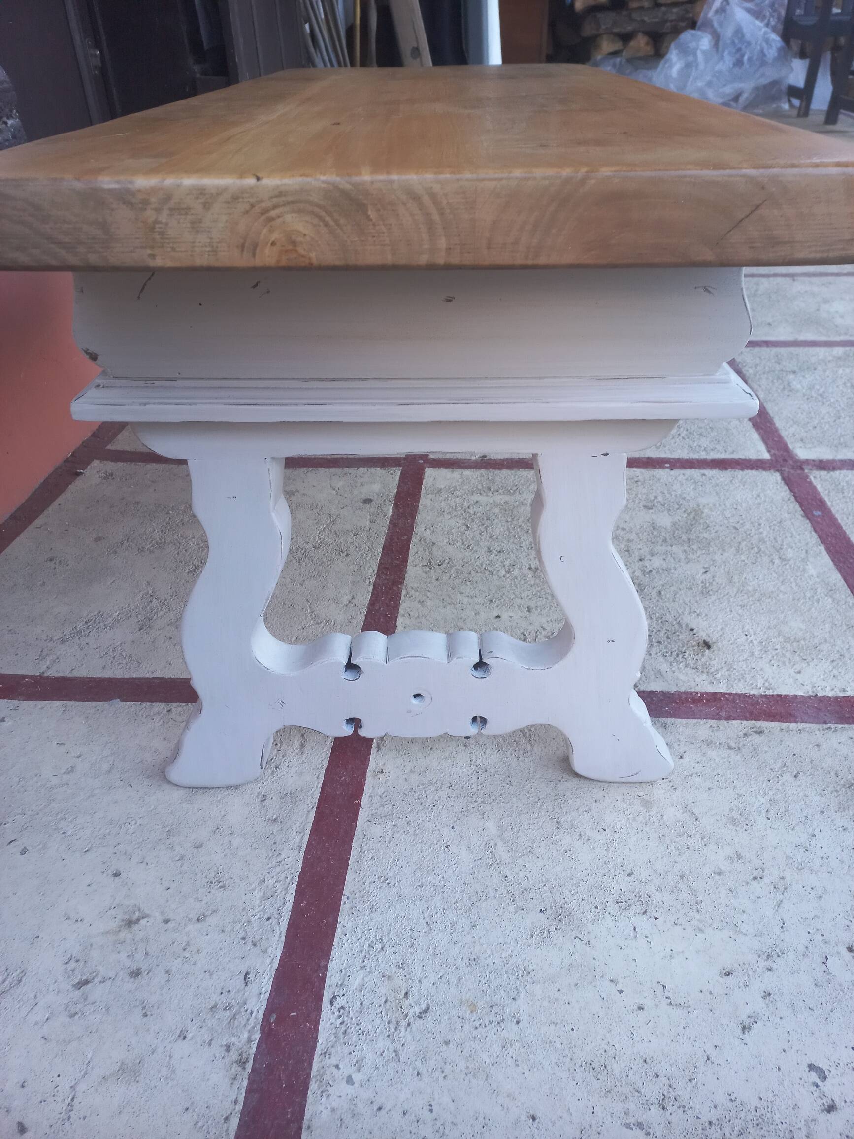 Patinated linen coffee table with raw top