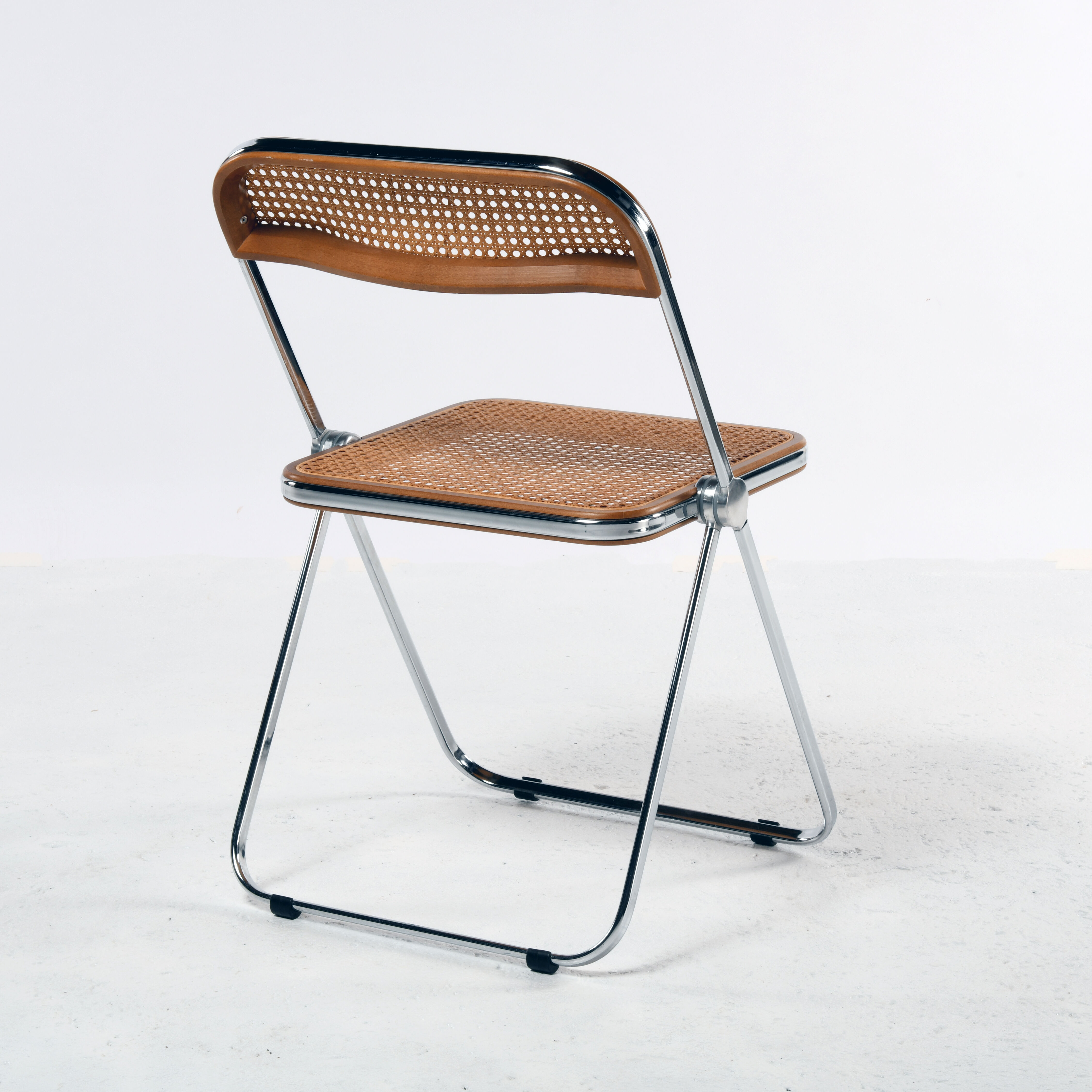 Plia cane chair Giancarlo Piretti Castelli