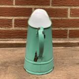 Vintage pitcher in green enameled sheet metal