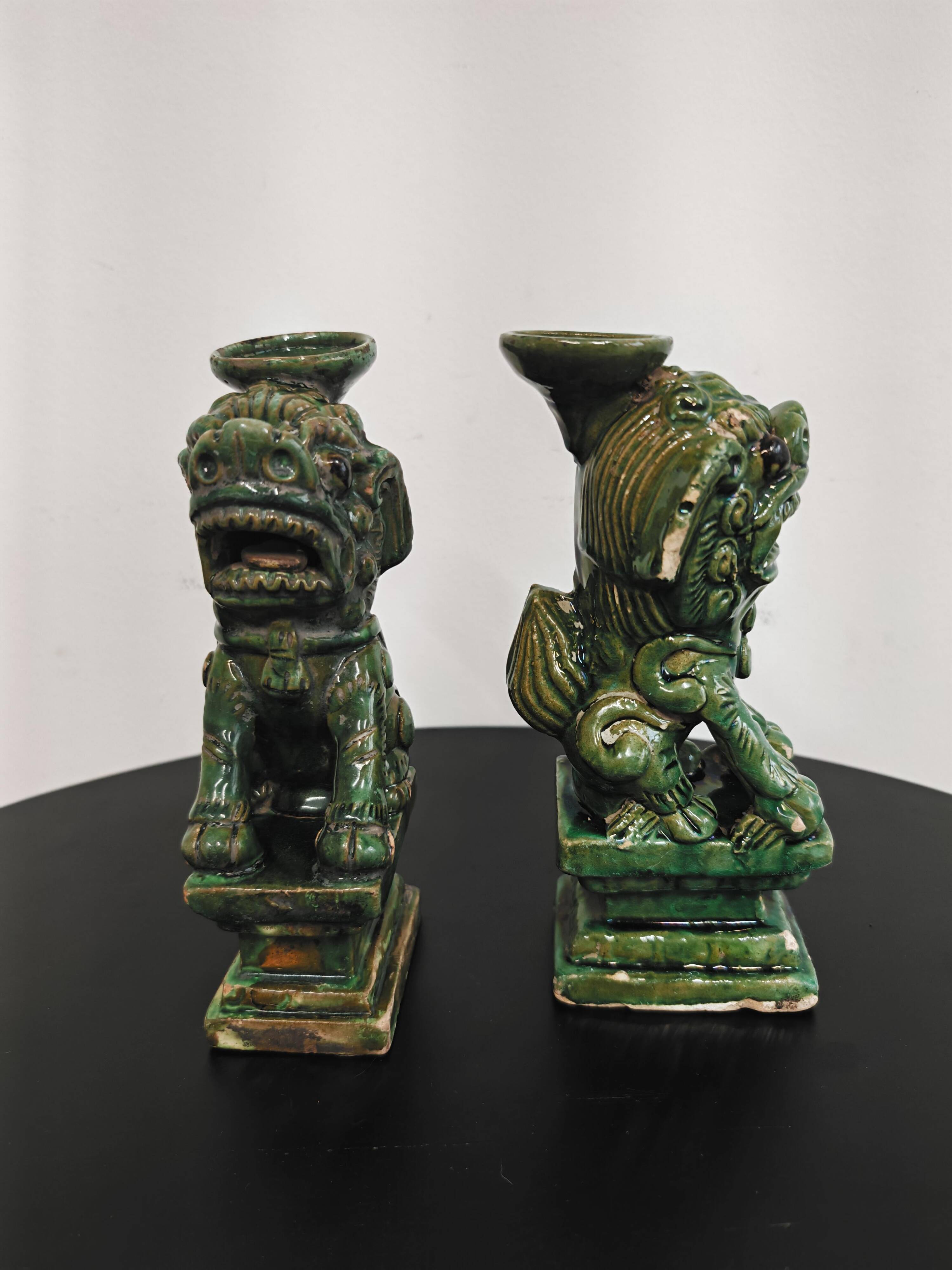 Pair of Foo Dog candle holders in ceramic, China 19th century