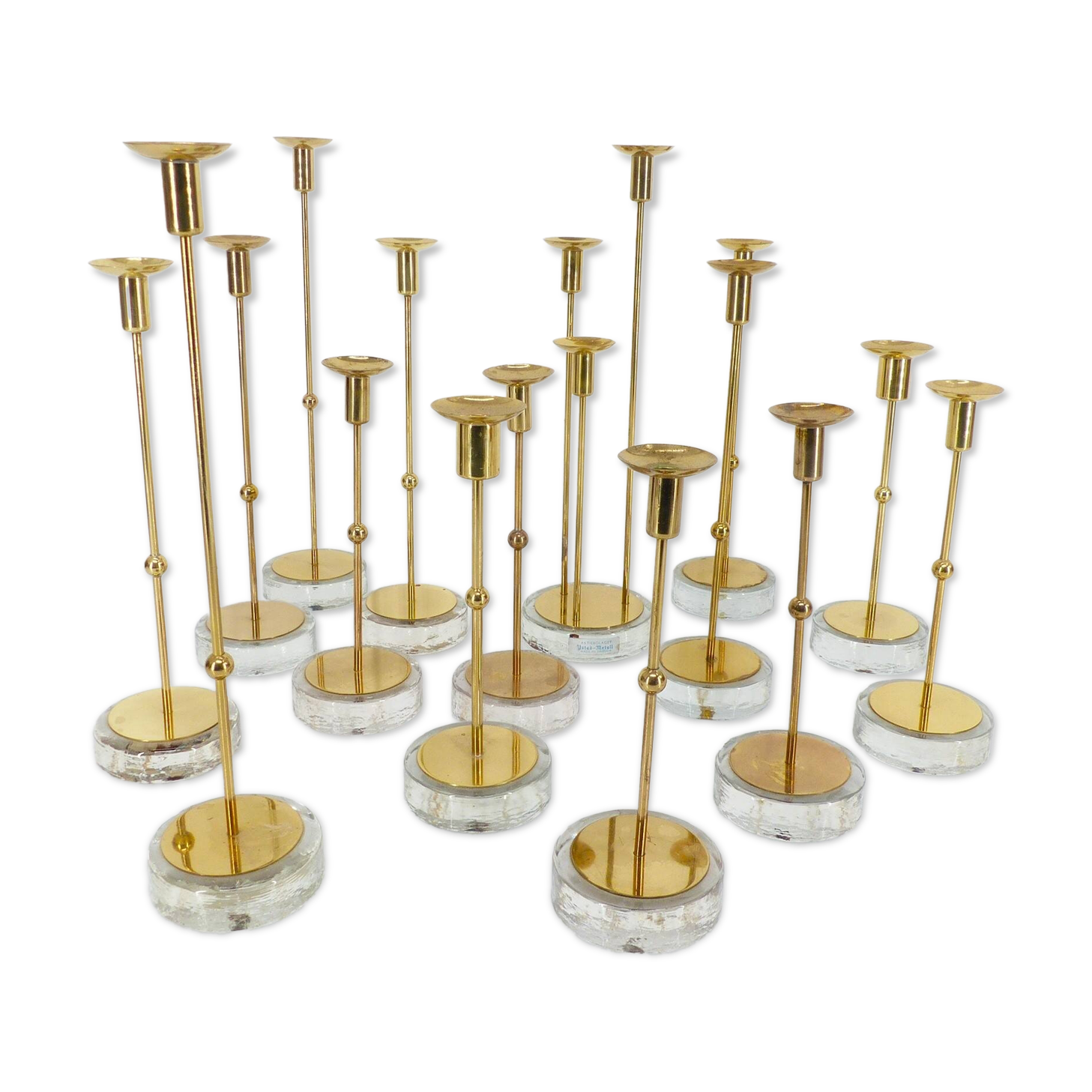 Set of 15 Scandinavian candle holders in brass and glass, Gunnar Ander, Ystad Met