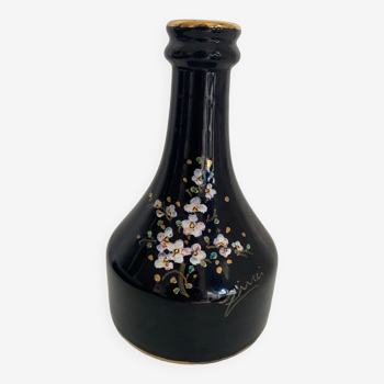 Black vase with flowers