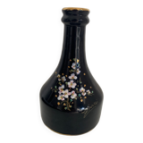 Black vase with flowers