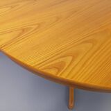 Vintage round table from the 60s and 70s in blond elm with integrated extension